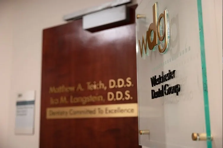 The entrance to Westchester Dental Group, with Dr. Teich's and Dr. Langstein's names on the door.