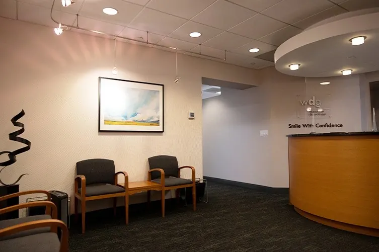 The reception desk and waiting area at Westchester Dental Group.